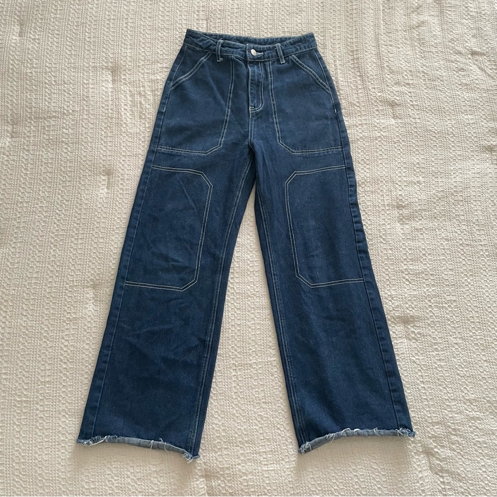 Blue cargo style baggy jeans with white stitching